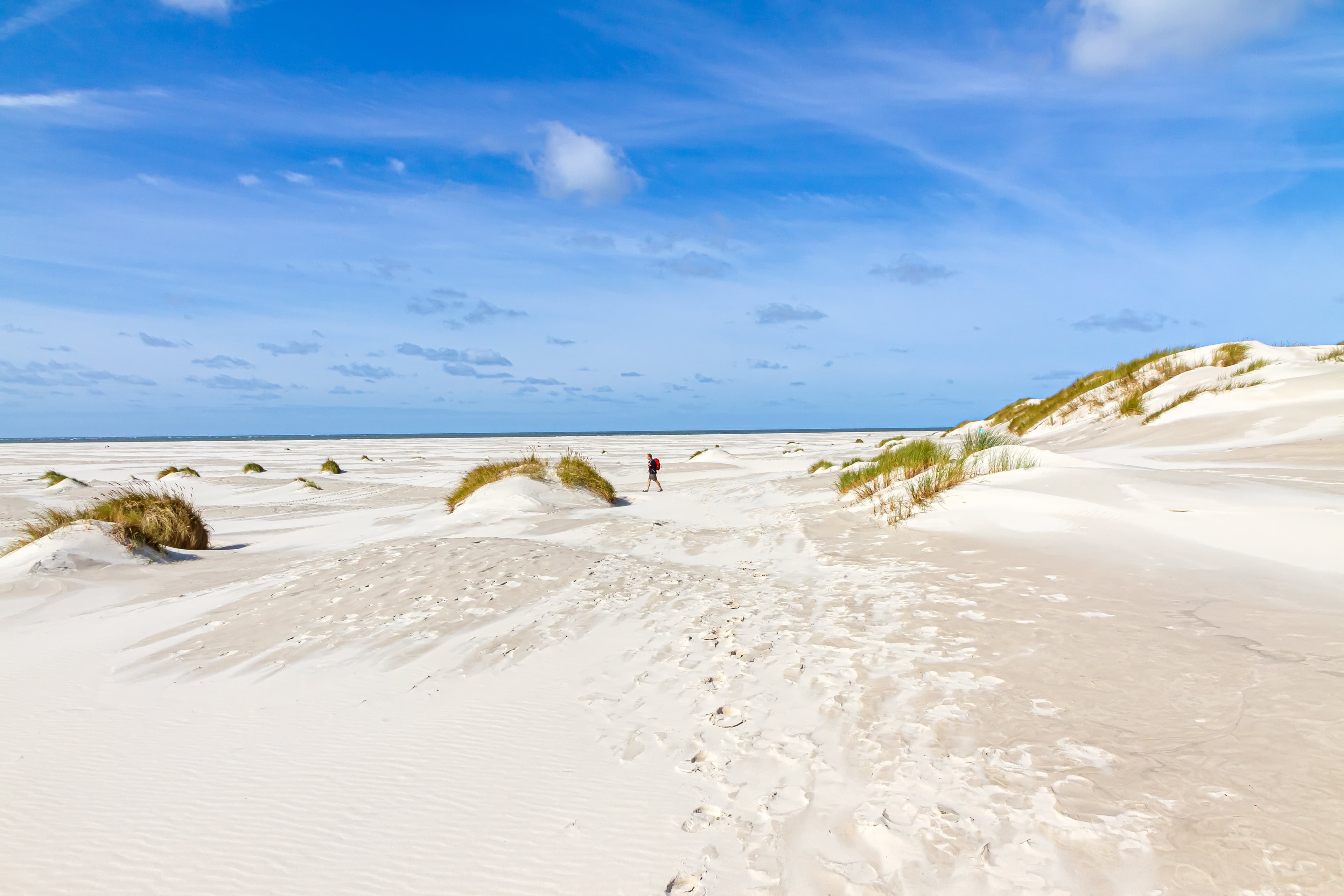 Amrumer Kniepsand: Einer der breitesten Sandstrände Europas – endlose Weite, feiner Sand und echtes Nordseegefühl.